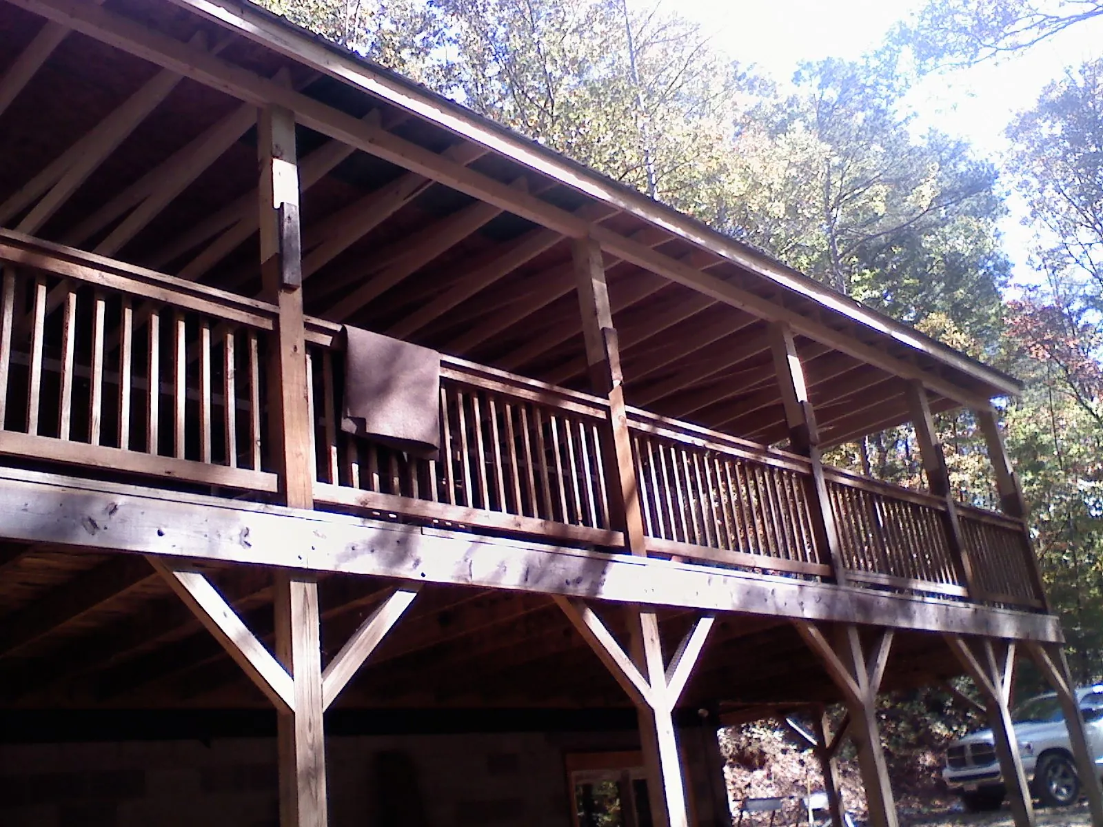 Timber framing under a new elevated porch and deck — Roof Leak Repair in Fishtail by Roofing Brothers